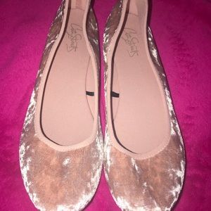 Woman’s velvet flats